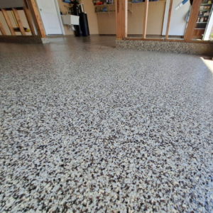 Close-up of garage with Asteroid flake color from Galaxy Concrete.