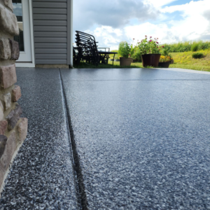 Close up of Night Sky patio flooring by Galaxy Concrete Coating.