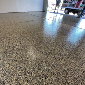 Close-up of Garage with Uranus flake color from Galaxy Concrete.