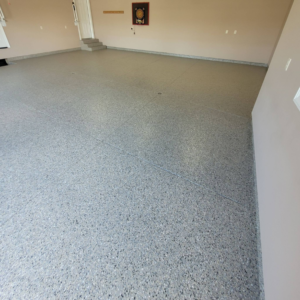 Garage floor with Moon Rock flake color from Galaxy Concrete.