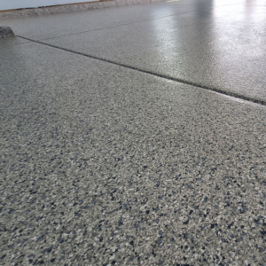 Close up of garage floor with Nebula flakes.
