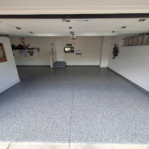 Garage floor with Outer Space flake color from Galaxy Concrete.