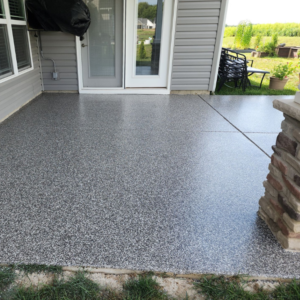 Patio floor with Night Sky flake color from Galaxy Concrete.