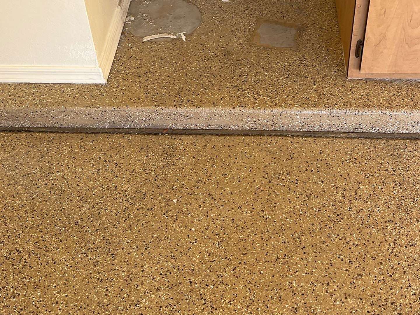 Garage floor that had epoxy coating on it