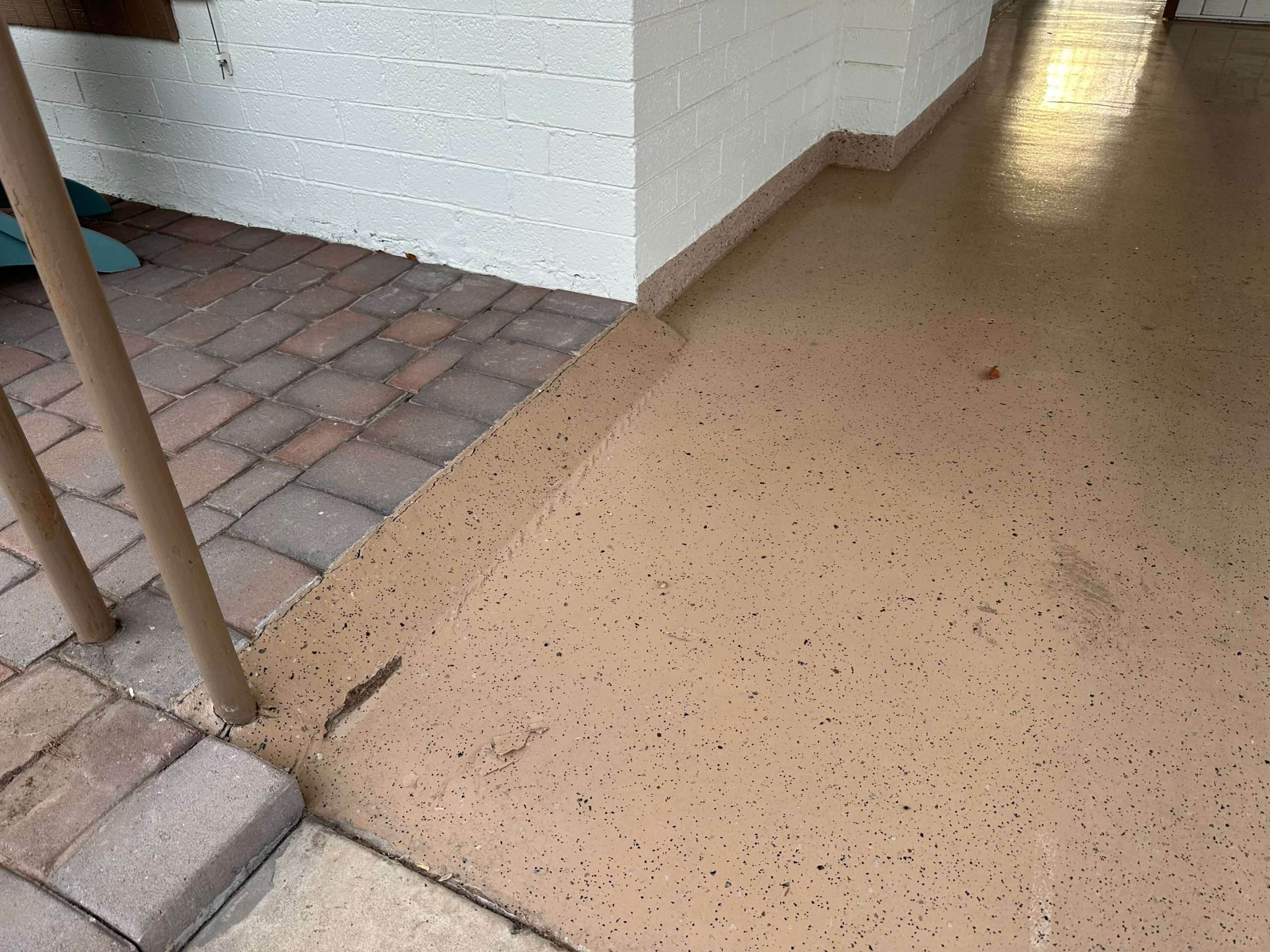Garage floor that had epoxy coating on it