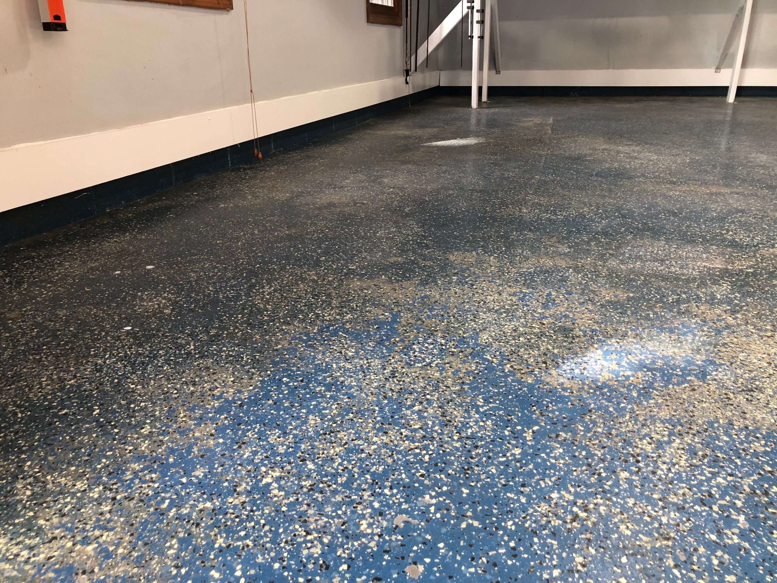 Garage floor that had epoxy coating on it